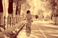 Vintage portrait of a girl with bike Royalty Free Stock Photo