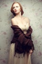 Vintage portrait of glamorous red-haired (ginger) girl posing Royalty Free Stock Photo