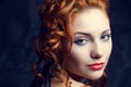 Vintage portrait of glamourous queen like red-haired woman Royalty Free Stock Photo