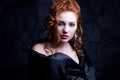 Vintage portrait of glamourous red-haired queen like girl Royalty Free Stock Photo