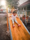 Vintage Portrait playing in a children playground