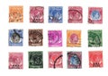 Vintage postage stamps from Malaya. Royalty Free Stock Photo