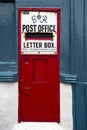 Vintage postbox in wall in seaside town in East Anglia