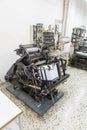 Vintage printing press in action from a printing center