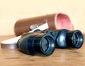 Vintage prism black color binoculars and brown leather case