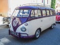 Vintage purple Volkswagen T1 Transporter on the street. Classic car exhibition in Loriol sur Drome, France. Royalty Free Stock Photo