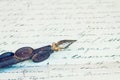 Vintage quill pen and antique letter