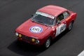 Vintage racing car, classic retro motor sport action, Alfa Romeo Giulia GTV 2000 on asphalt race track Royalty Free Stock Photo