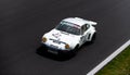 Vintage racing car, classic retro motor sport action, Porsche 911 RSR on asphalt race track