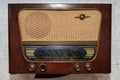 Vintage radio. Retro broadcast table radio receiver. Very old radio.