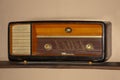Vintage radio on the wooden shelf