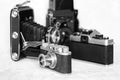 Antique film rangefinder and SLR cameras Royalty Free Stock Photo