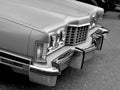 Vintage rare old  car on the street black and white headlights in a focus Royalty Free Stock Photo