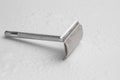 Vintage razor with water droplets on white Royalty Free Stock Photo