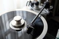 Vintage record player with graphite tonearm closeup view Royalty Free Stock Photo