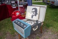 Vintage record player which has the lid open and a copy of Buddy Holly Story record is leaning against the lid Royalty Free Stock Photo