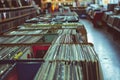 Vintage record store with rows of vinyl records and cassette tapes Royalty Free Stock Photo