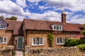 Vintage red brick rural buildings in English style