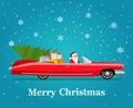 Vintage red cabriolet with santa claus, christmas tree and gift boxes.