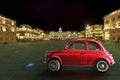 Vintage red car in the historic city of Trieste, Italy. Night Royalty Free Stock Photo