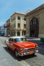 Vintage red car on the street of old city, Havana, Cuba Royalty Free Stock Photo