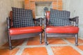 Vintage red chair and black Pillow in the room Royalty Free Stock Photo