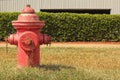 Vintage Red Fire Hydrant in Front of Building Royalty Free Stock Photo