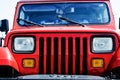 Vintage red Jeep car front side Royalty Free Stock Photo