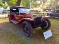 Vintage red 1926 Lancia Lambda VII Series Torpedo in a park. Aut Royalty Free Stock Photo