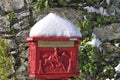 Vintage red mailbox under the snow Royalty Free Stock Photo