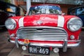 Vintage Red mini Morris car in classic motor shows on Australia day.