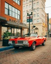 A vintage red Oldsmobile 442, in downtown Flint, Michigan Royalty Free Stock Photo