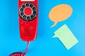 Vintage red phone and speech ballons Royalty Free Stock Photo
