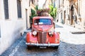 Vintage red pickup on street in Trastevere Royalty Free Stock Photo