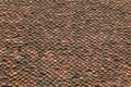 Vintage red roof terracotta tile. Old roof tiles background. Texture ancient. Red brown roof tiles Royalty Free Stock Photo