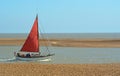 Vintage Red Sailed Boat at Felixstowe Ferry