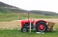 Vintage red tractor in a field in UK Royalty Free Stock Photo