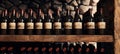 vintage red wine bottles in a rack Royalty Free Stock Photo