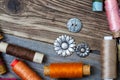 Vintage reels of varicolored thread and old buttons