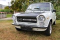 Vintage retro autobianchi abarth car parked on a grassy field