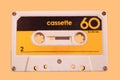 Vintage retro cassette tape on pastel colors background, gadgets for The 70-80-90`s