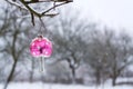 Vintage retro Christmas tree glass decoration snowy red toadstool fly agaric outdoors winter landscape, snow falling Royalty Free Stock Photo