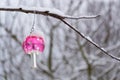 Vintage retro Christmas tree glass decoration snowy red toadstool fly agaric outdoors winter landscape, snow falling Royalty Free Stock Photo