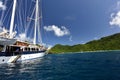 Vintage retro classic old sailboat sailing on dark blue ocean. Royalty Free Stock Photo