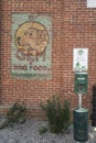 Vintage Retro Dog Food Ad on Brick Wall