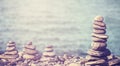 Vintage retro hipster style image of stones on beach. Royalty Free Stock Photo