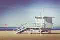 Vintage retro picture of wooden lifeguard tower, Beach in Califo Royalty Free Stock Photo