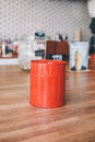 Vintage retro red tip box for good service on a coffee shop`s counter. Royalty Free Stock Photo