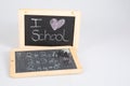 Vintage retro slate text heart i love school with copy space on grey background Royalty Free Stock Photo