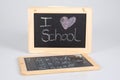 Vintage retro slate text heart i love school on grey background Royalty Free Stock Photo